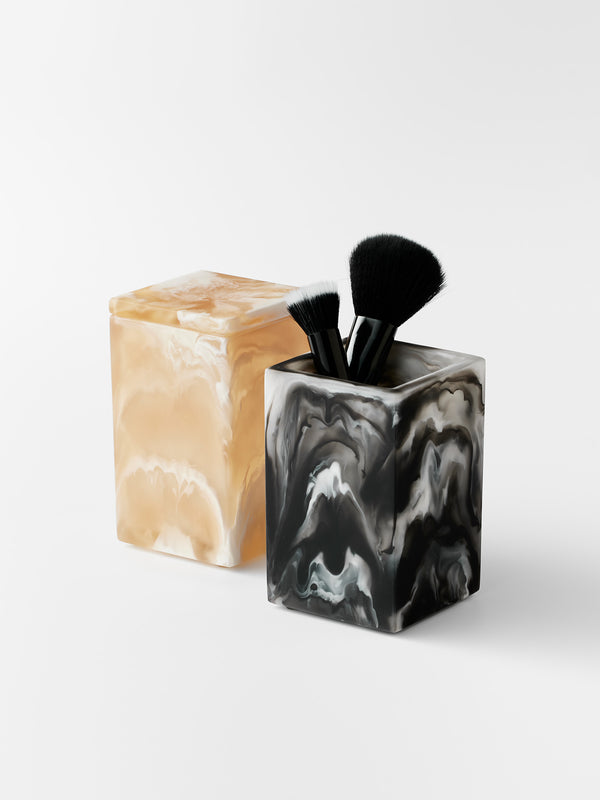 Square resin containers by Lulu Mosquito